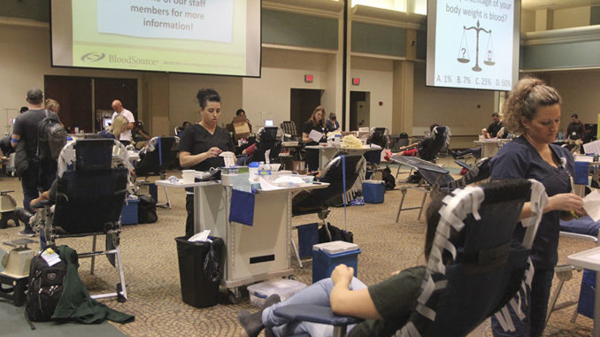 Students giving blood at the Blood Drive in the University Ballroom on Tuesday, Feb. 16, 2016.