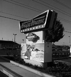 Image: It?s just Krispy Kreme Doughnuts:Sacramento Krispy Kreme, located at 3409 Arden, have a doughnut-making machine capable of producing 270 dozen doughnuts each hour.: