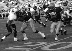 Image: "D"-lightful: Hornets rout Weber State:Sac State's Charles Roberts heads up-field in Saturday 35-7 win over Weber State.: