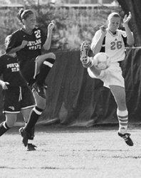 Image: Women?s soccer defeats Montana and Portland State:Lisa Wrightsman blocks a ball against Portland State.: