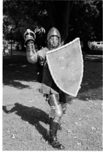 Image: Reliving the Medieval Times:Sacramento State student and Society for Creative Anachronisms member Camber Menschell, shows off his medieval armor and costume.: