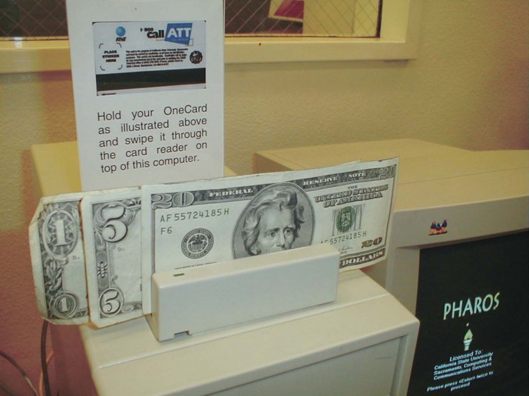 Image: New printing system utilizes new technology:Campus printers are now equipped with OneCard readers as the cost of printing is now 5 cents a page.: