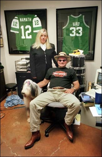Image: Sac State alumna finds ?Big? success:Photo by owen Brewer/courtesy Sacramento BeeSandy Dalaney, background, a Sacramento State business graduate, co-owns Big Hairy Dog Information Systmes with her husband Mic, seated. The company is named after the couple?s sheepdog Molly Marie, left.: