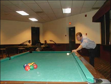 Image: Billiards player on cue:Sac States Jason Johnson took fifth place at the Association of College Unions International Billiards Championships held at Indiana University.Photo by Layla Bohm/State Hornet :