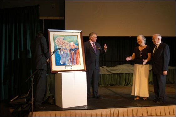 Image: Gerths career with CSU celebrated:Stan Atkinson hosted the event where Gerth, with his wife Bev (center), was given a painting of himself.Photo By Matt Schrap/State Hornet: