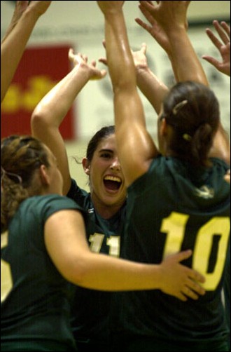 Image: Volleyball rebounds in second day of tourney:Sac State celebrates during their 2-2 performance at the Sacramento State Invitational.: