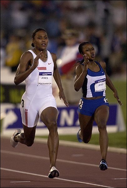 Image: Olympic trials a big hit for fans, athletes:Marion Jones, left, winner of five gold medals at the 2000 Olympics, finished seventh in the qualifying round of the 100-meter dash on Friday. Jones finished fifth in the finals on Saturday and did not qualify for the 2004 Olympics. David Martin Olson/St: