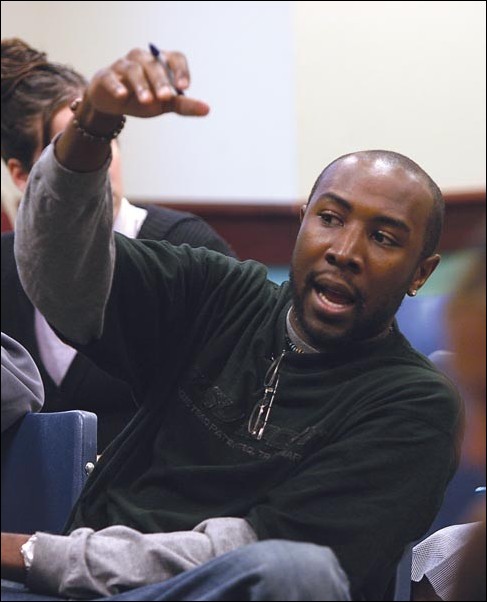 Image: Kobe Bryant trial dissected during roundtable talk :Grad student Kory Martin shares his views about the Kobe Bryant trial during a discussion in the University Union Monday.: