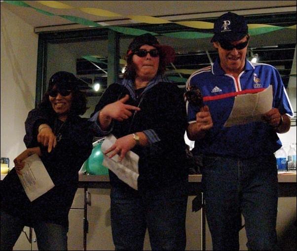 Image: Language students honored:Assistant Japanese professor Kazue Masuyama, French lecturer Laurence Lambert and French and Italian professor Kevin Elstob perform a rap written to celebrate their students work in the foreign language department.  Jamie Gonzales/State Hornet: