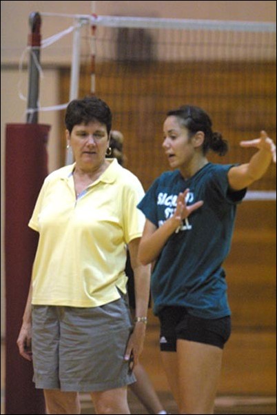 Image: Volleyball coach in league of her own :Hornet coach Debby Colberg, left, has won eight-straight Big Sky Championships.Sean Hogan/State Hornet: