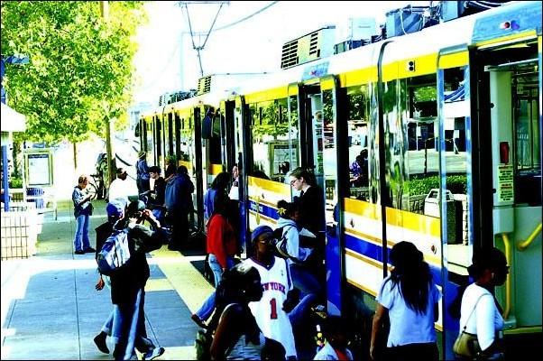 Image: Project would bring light rail to campus:Commuters boarding the light rail on 65th Street on Monday could have additional transportation options to get to Sacramento State in two years if funding is secured for a project that would include a light-rail extension and a track around campus.  :