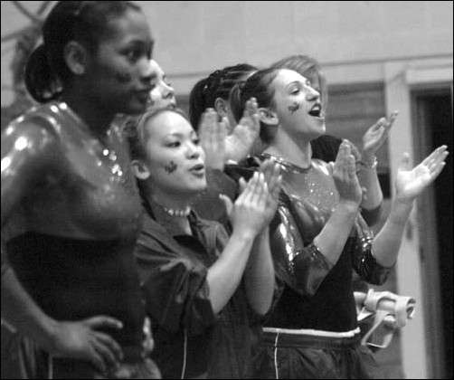 Image: Campus safety benefits from five-minute response times:Senior Binta Coleman, left, Kimiye Narasaki, middle, and the rest of the Hornets cheer on teammates during the narrow victory.: