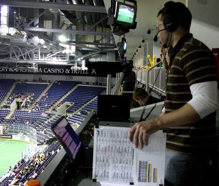 Greg Young Jr., a Sacramento State graduate of communication studies, does the play-by-play of a Major Indoor Soccer League game on Thursday. The California Cougars lost 20-10 to the Chicago Storm in the Stockton Arena.: