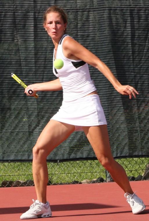 Sophomore+Karina+Jarlkaganova+keeps+her+eye+on+the+ball+in+singles+competition+in+the+Big+Sky+tourney+on+Apr.+28+at+the+Gold+River+Racquet+Club%3A