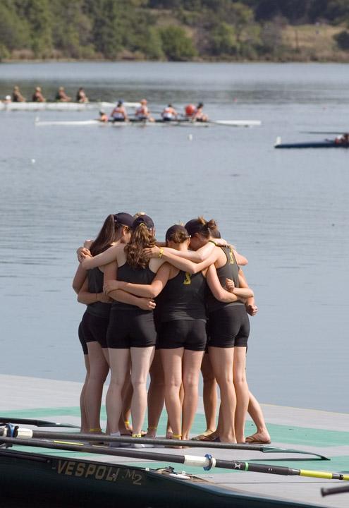 Members of the second varsity eight rowing squad huddles up before launching off on Sunday. The squad placed third at the WIRA Grand Finals at the Aquatic Center at Lake Natoma. :