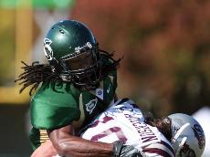 Receiver Ryan Coogler is tackled during the Hornets 17-3 loss to Montana on Saturday.:
