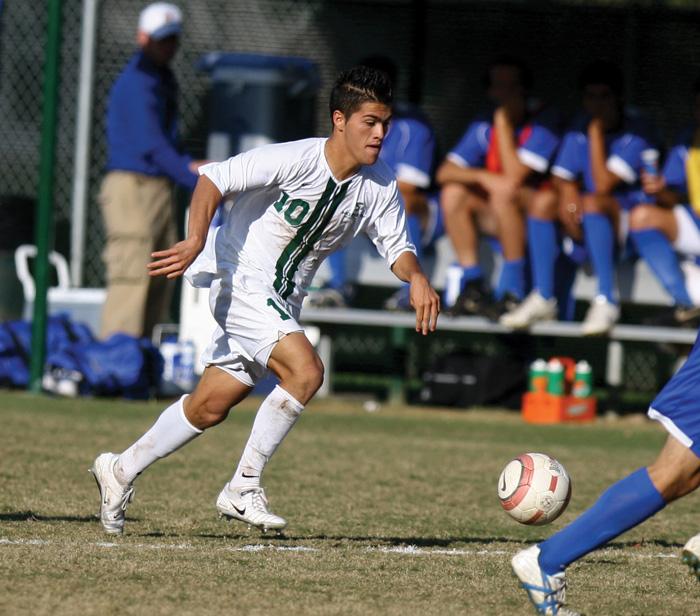 Sacramento State Ernesto Carranza moves the ball through middle field against San Jose State during Sundays game.: