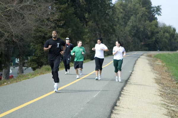 Members of Hornets on the Move start off their run along the American River bike trail.: