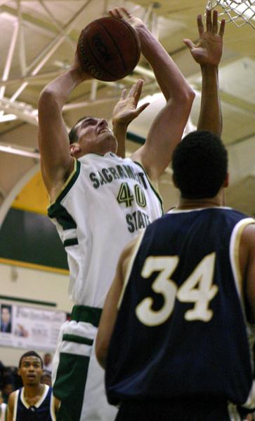 Media Credit: Claire Padgett. Sophomore Justin Eller gets a layup in the first quarter of the Big Sky Conference game against Northern Colorado Saturday.: