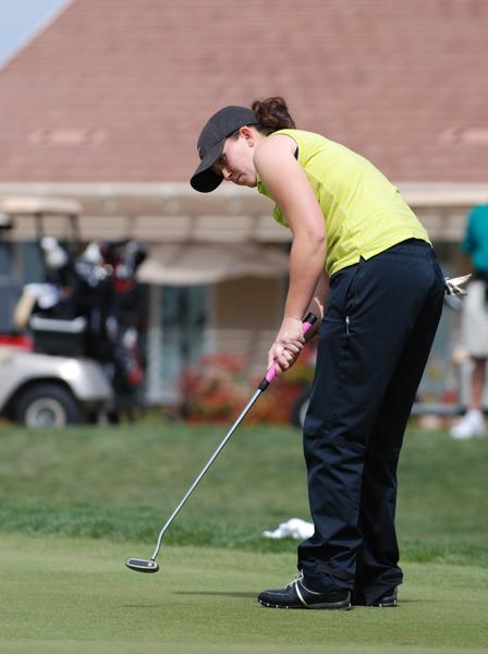 Kim Coppin, senior, putts on hole seven on Tuesday at Lincoln Hills Golf Club.: