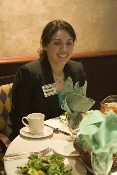 Elizabeh Uribes awaits her meal at the Union Restaurant during the Etiquette Dinner on Thursday.: