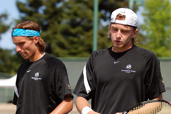 Sophomore Anton Stryhas, left, and freshman teammate Kiryl Harbatsiuk walk off the court after a loss in their doubles match in the Big Sky Tournament final on Sunday at Gold River Racket Club.: