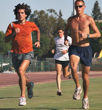 Media Credit: Jason Finley - Sacramento State Cross Country runners Dominic Vogl (left), Jason Sey (right) warm up in an early morning practice Friday September 5th in preparation for the Aggie Open in Davis Saturday, September 6th.: