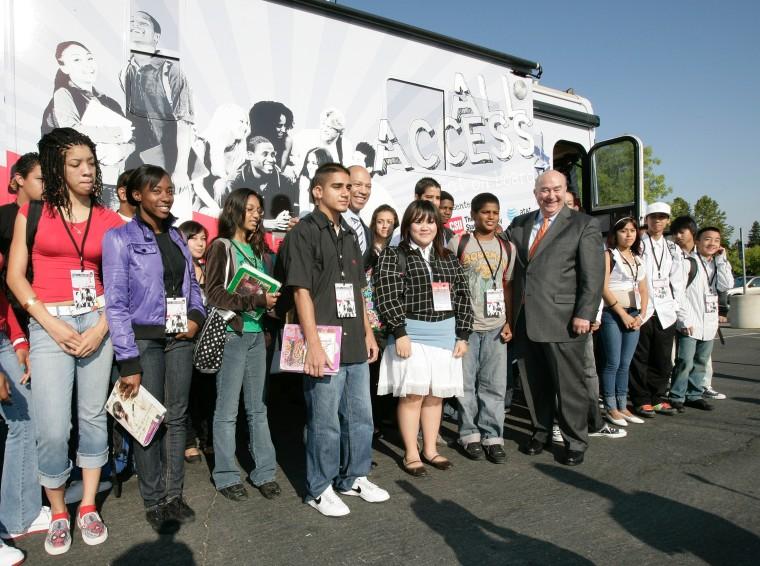 AT&T Califonia President Ken McNeely and California State University Chancellor Charles B. Reed stands with Valley High School students during the CSU Road to College in Sacramento on Sept. 10. The tour will end on Oct. 3, at a high school counselors conference in Santa Clara.: