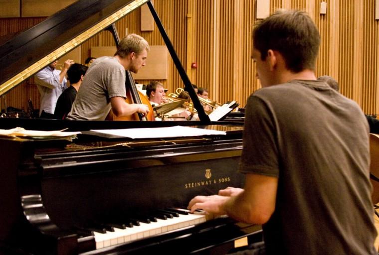 The Sacramento State Jazz Ensemble rehearses a piece called Indian Riffs by Matt Catingub in a recital hall at Capistrano Hall.: