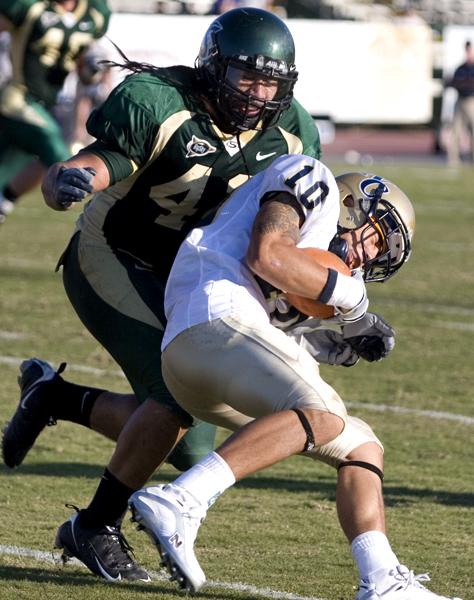 Hornet Linebacker Cyrus Mulitalo stops a receiver for a loss in Saturdays game against Northern Colorado.: