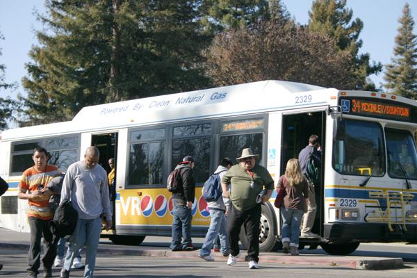 With the recent tuition and parking permit fee increases, students explore alternative transportation such as riding the bus or taking the light rail to cut expenses.:Claire Padgett