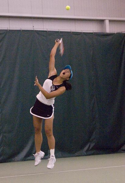 Junior Aileen Tsan serving the ball in todays game against Montana State at Spare Time Indoor Tennis Center in Gold River March 8.:Claire Padgett