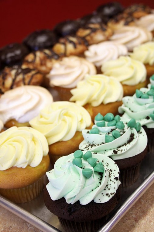 Rows of freshly baked cupcakes on display last Friday at Cupcake Craving located just a few miles from campus at 2100 Arden Way.  - Shannon Schureman
