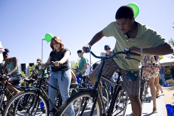 Communication studies major London Donson tries out a new bike given to him free of charge. Approximately 40 students received the free bikes in an effort by Sacramento State and local transportation advocacy groups to promote clean transportation Sunday at the Upper Eastside Lofts. :