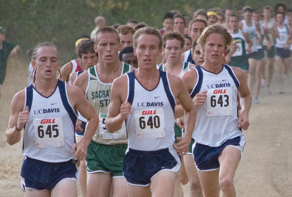 Surrounded by a swarm of UC Davis Aggies, Scott Grose looks to make his break at the Hornet Jamboree. The men placed second and the women finished third.:Robert Linggi