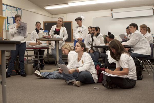 nursing:Nursing students crowd into a classroom in El Dorado Hall to work on a simulation dummy. A grant from the Doyle Foundation will provide more space for learning.:File Photo