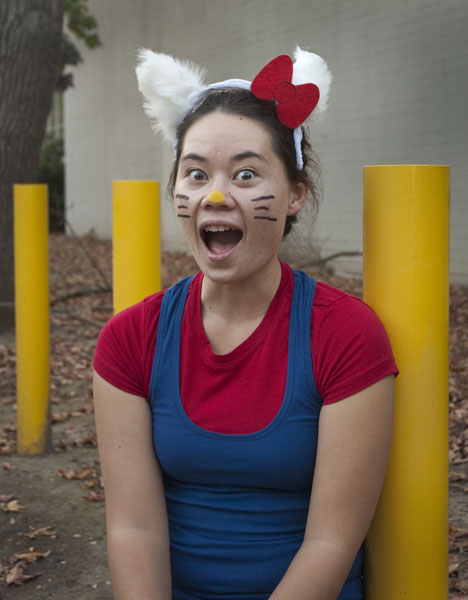 Jennifer shows off her homemade Hello Kitty halloween costume. :