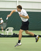 Harbatsiuk small:Kiryl Harbatsiuk, junior finance major, returns the ball during a doubles match against Weber State University.:Tony Nguyen - State Hornet