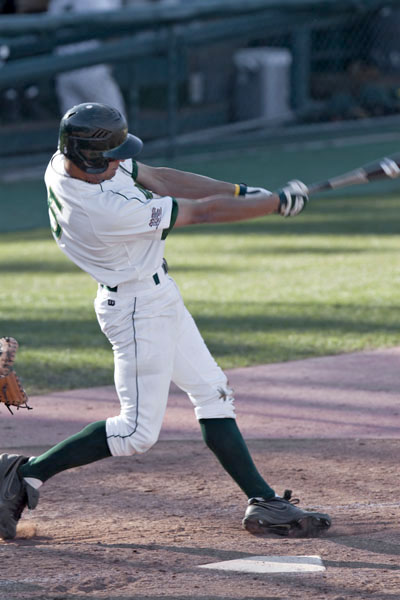 Powers Hitting:Josh Powers first baseman bats for the Sac State Hornets at the game on Saturday at the Hornet baseball field.:Julie Keefer State Hornet