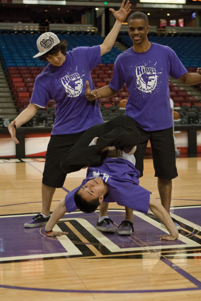 Kings Breakers:The offical Kings Break Dancing team, the King Breakers, warm up before a performance Friday. Sac State students Kurt and Vince Horiuchi (left; center) and Jayson Shaw (right) are members of the team.:Julie Keefer - State Hornet