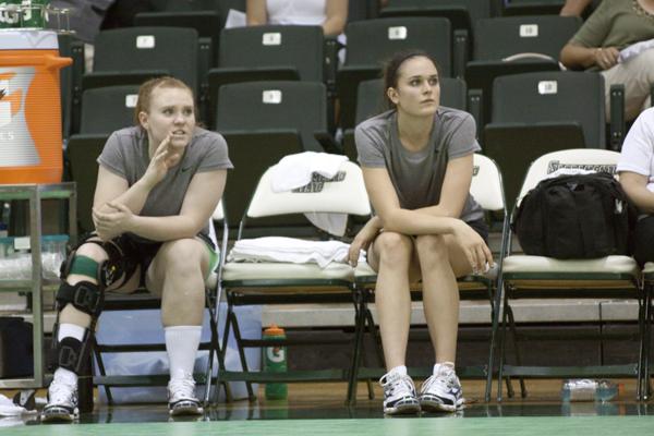 injuries:Injured players Maddison Thivierge (right) and Hannah Hettinga (left) cheer on the team from the sidelines.Thivierge is still named co-captain despite being injured.:Brittany Bradley - State Hornet