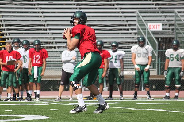 QB :Senior quarterback McLeod Bethel-Thompson throws a pass in a scrimmage during training camp:Ashley Neal - State Hornet