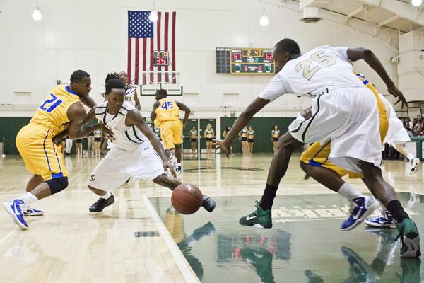 Sacramento State mens basketball drops season opener 80-78 against Bakersfield:Hornets players Antione Proctor and Alpha NDiaye attempt to capture a loose ball during Sunday nights game at the Hornets Nest against CSU Bakersfield. The Hornets suffered a heartbreaking loss of 80-78 in overtime.:Ashley Neal - State Hornet