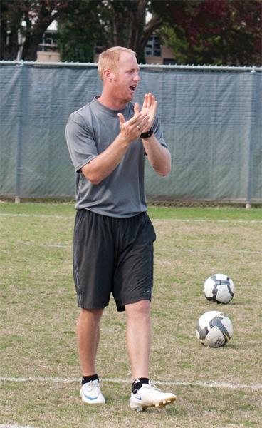 McDougall soccer:Assistant coach Matt McDougall motivates his team during practice.:Steven Turner - State Hornet