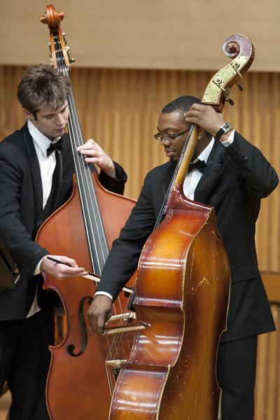 orchestra2:Two members of the Los Medanos College Concert Band play string bass.:Robert Linggi and Jesse Sutton-Hough - State Hornet