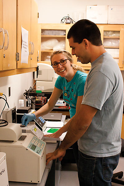 Science Grant:Senior biological clinical lab science major Kelly Davis and senior molecular biology major Sam Paris work at the research facility located in Sequioa Halls basement. :Brittany Bradley - State Hornet 