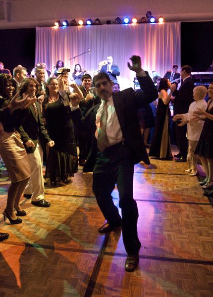 green and gold gala :Guests at the Green and Gold Gala start a soul train and show off their moves Friday in the University Union Ballroom.:Mayra Romero - State Hornet 