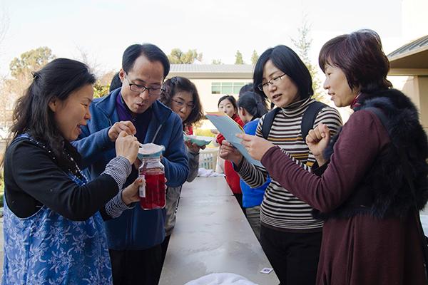 South Korean student teachers:From left to right: Teachers Park Soonok, Ha Namchil, Choi Soonok and Kim Sungmi from Chinju University in South Korea, take a break from class to make ice cream.:Robert Linggi - State Hornet