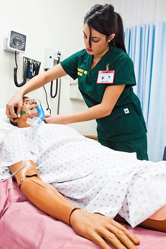 Nursing program moves 2:Sac State nursing student Simi Gosal participates in one of the program?s simulation labs in the new department in Folsom Hall.:Ashley Neal - State Hornet