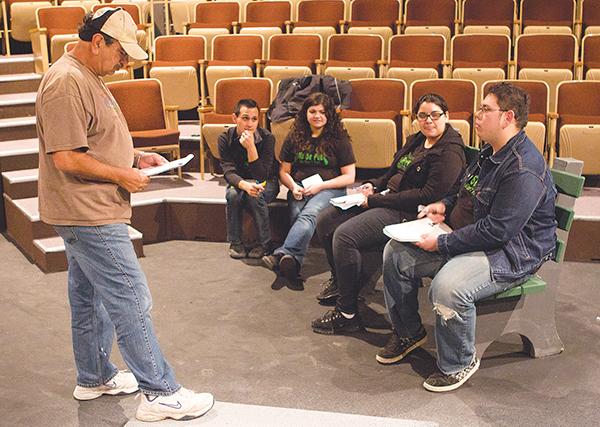 Director and cast of No Se Paga:Director Manuel Pickett gives his cast of No Se Paga pointers on how to improve the performance at rehearsal on Thursday night.:Nicole Lundgren - State Hornet